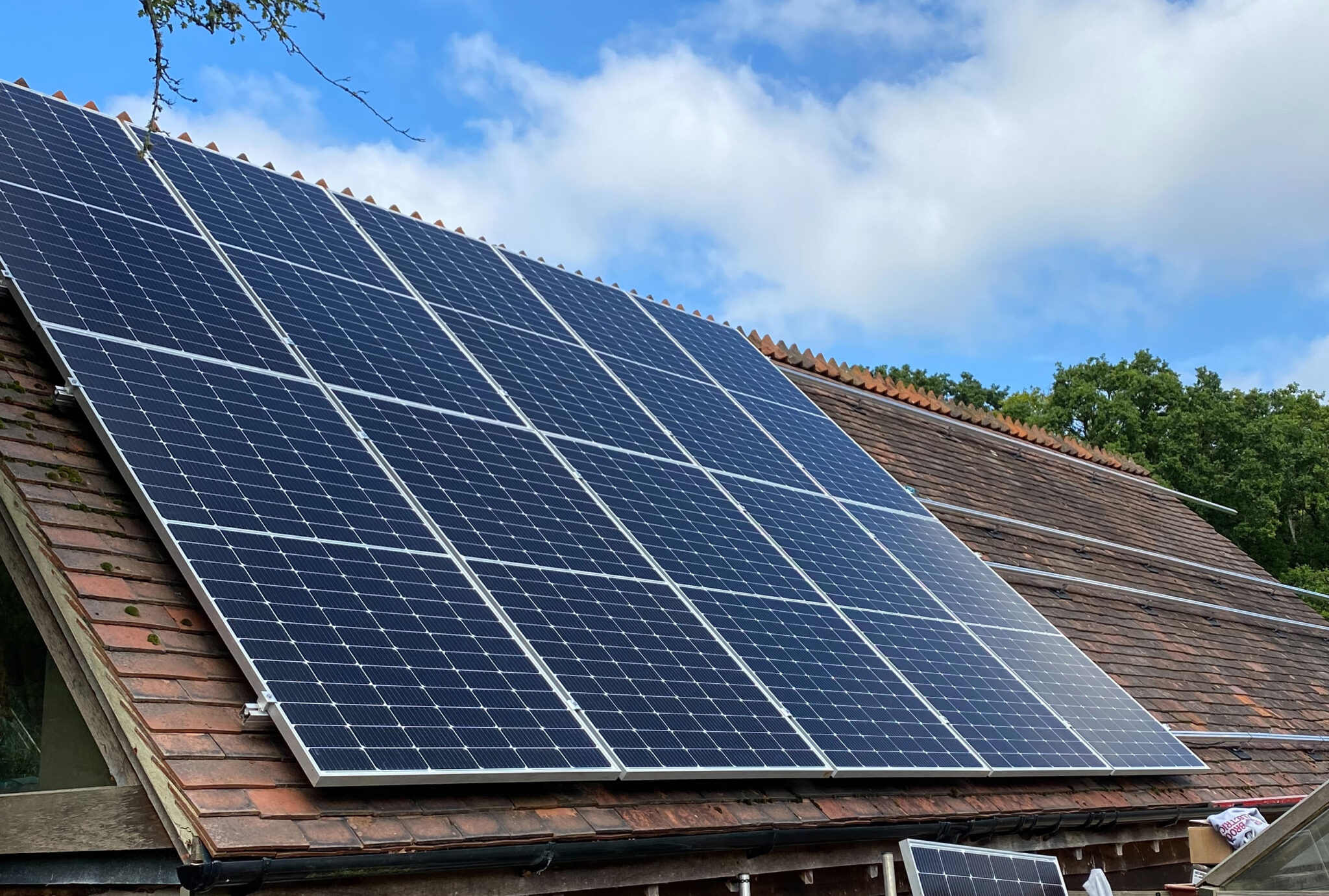 roof mounted solar panels generating renewable energy outside on a sunny day